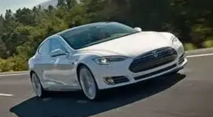 a Tesla driving on the freeway