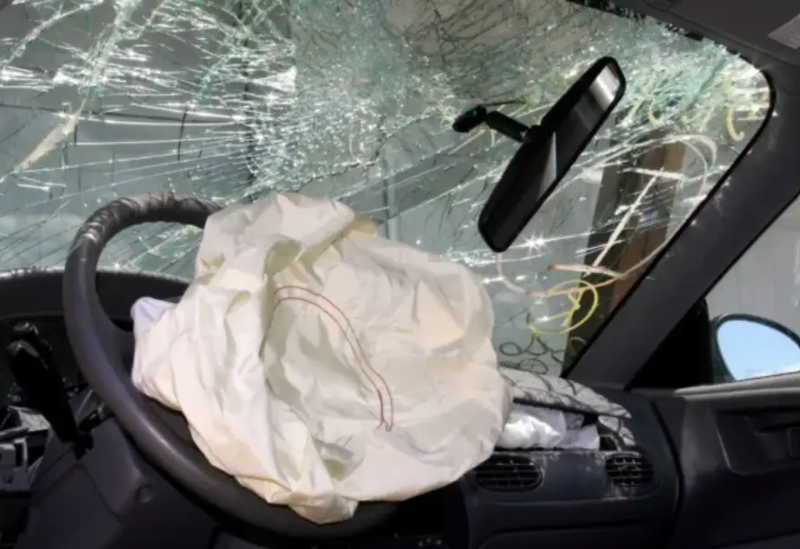 an airbag exploads in a car accident