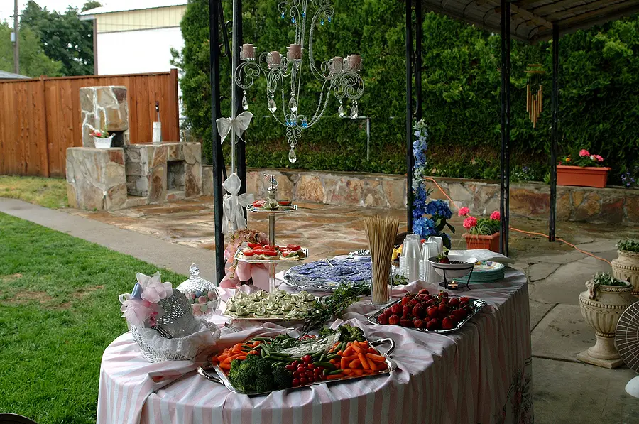 a baby shower table of food