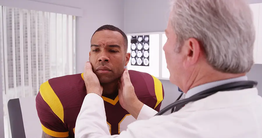 An athlete received a medical check for a head injury