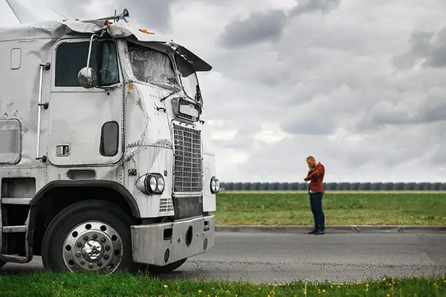 a stranded big rig on the highway