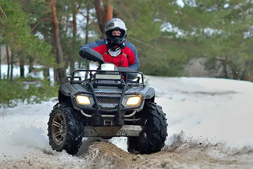 man on a utility atv