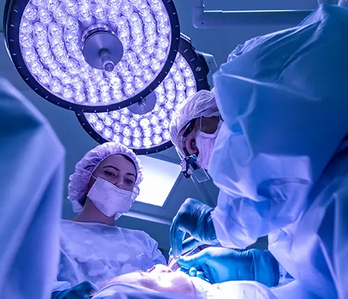 two surgeons in the operating room.
