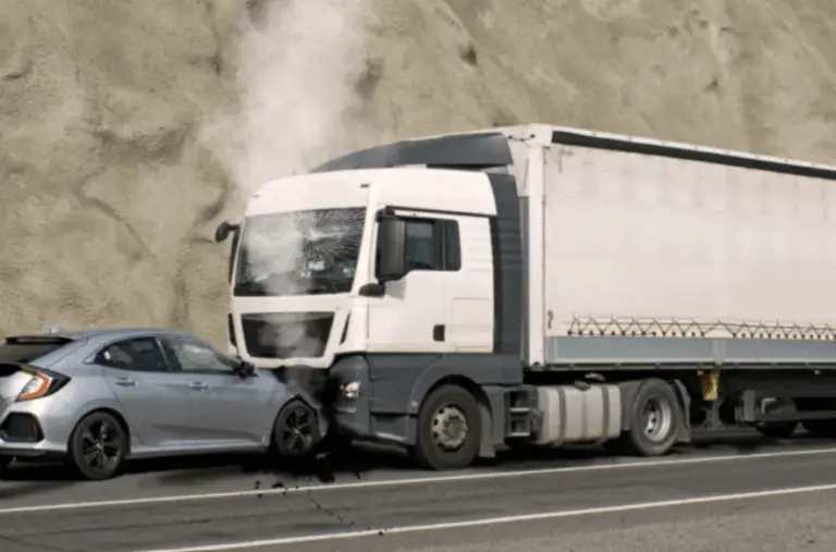 A big rig slamming into a small car