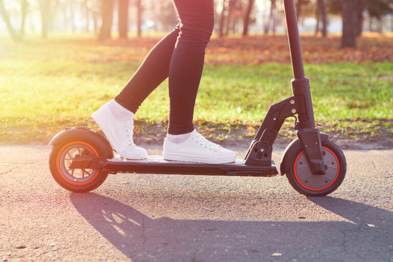 A person riding an electric scooter