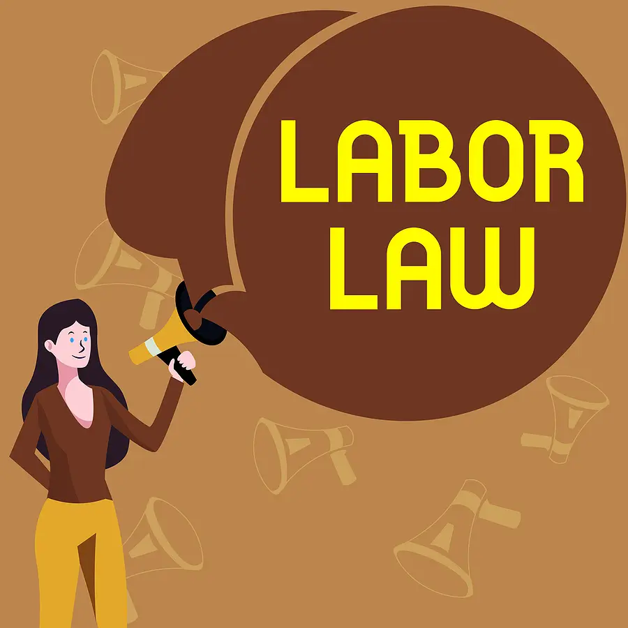 A woman holding a labor law sign.