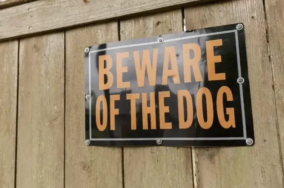 A beware of dog sign