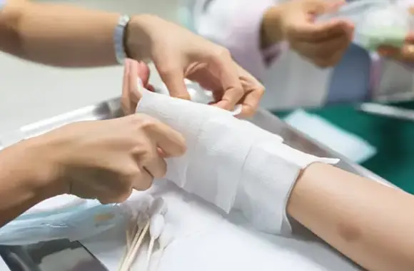 a bandaged arm after a dog attack
