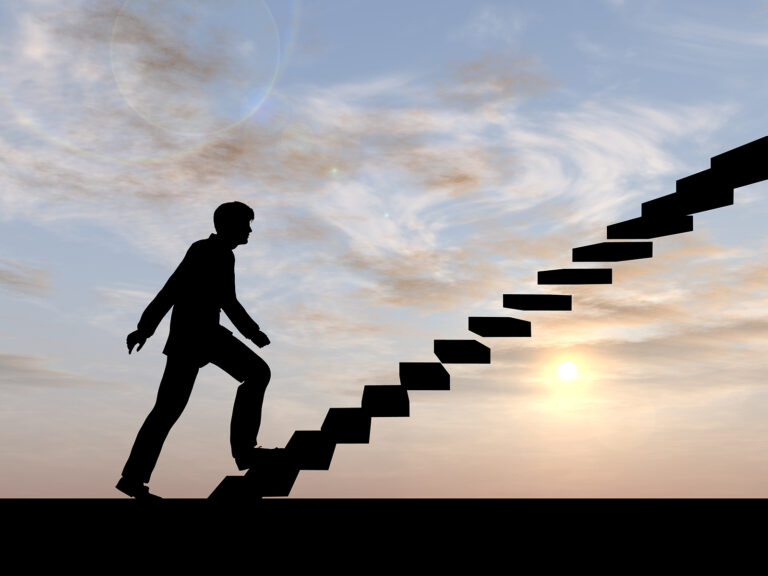 Employee walking up the steps