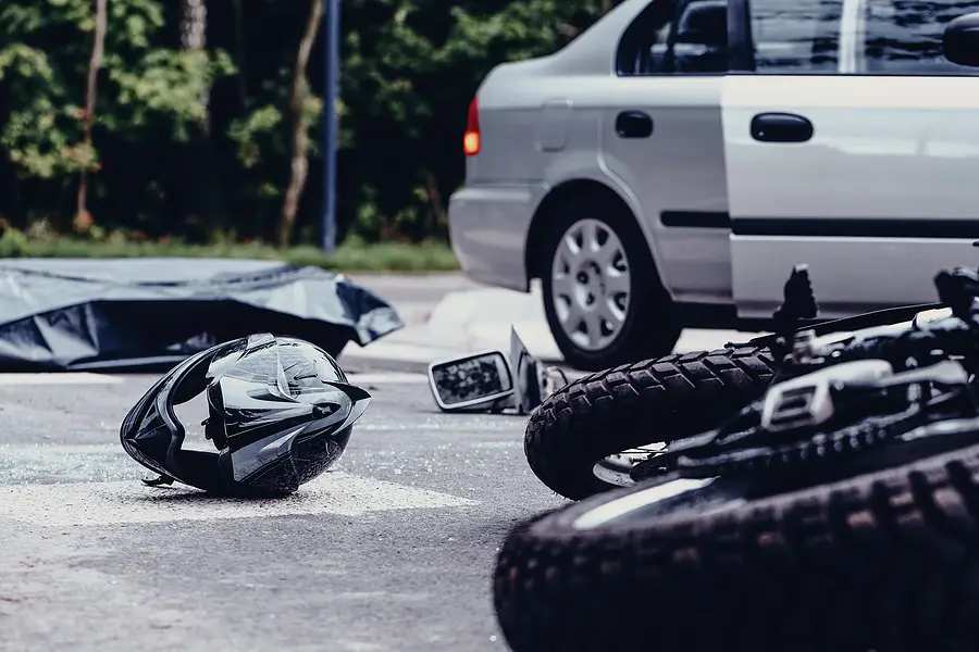 Motorcycle Helmet On The Street After Terrible Car Crash, Black