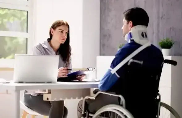 a female attorney talking with an injured victim